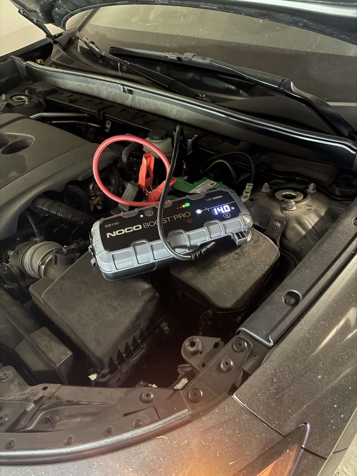 Portable jump-start equipment connected to a vehicle battery
